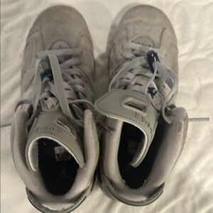 Kids Gray Sneakers Air Jordan’s in good condition. Only worn a few times!